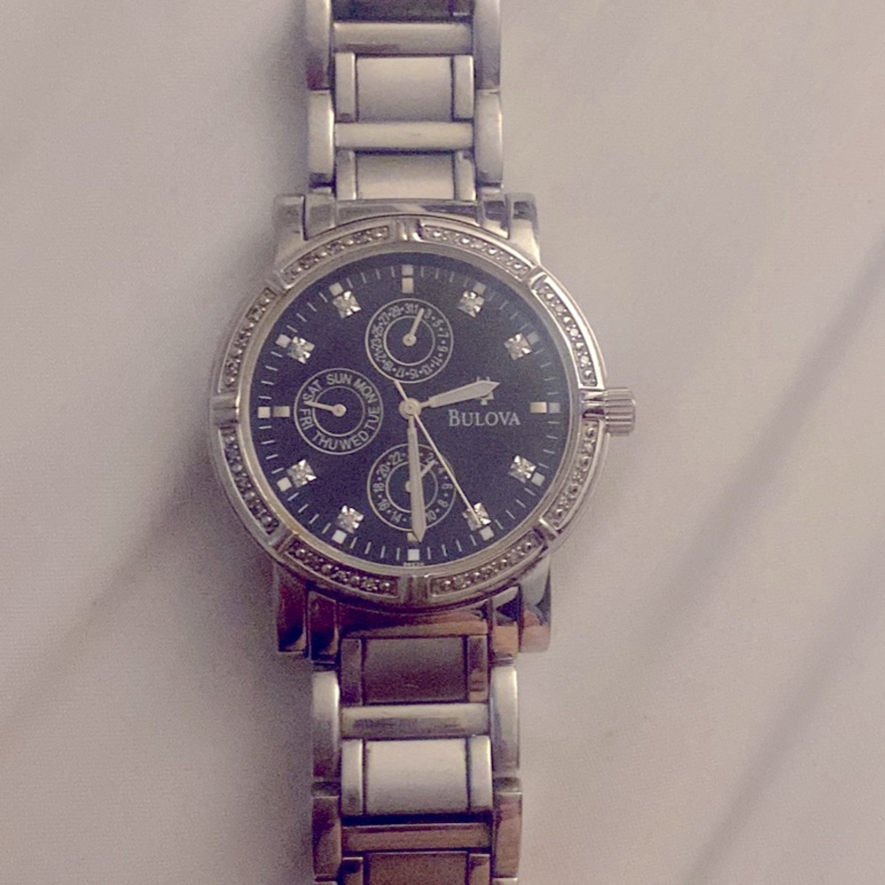 Mens Bulova Diamond Watch.  Used like new.  Needs battery.  Blue Dial. 40mm